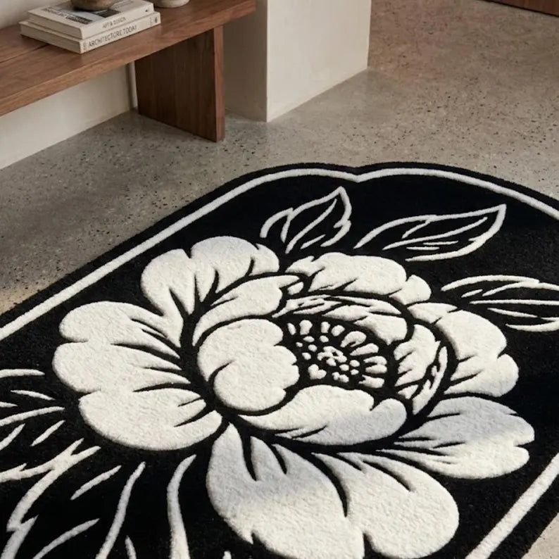 Handmade Black Floral Area Rug | Tufted Wool