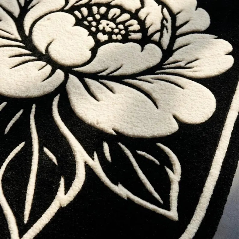 Handmade Black Floral Area Rug | Tufted Wool